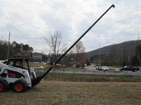 skid steer boom and bucket manually